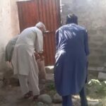 Chairman Furrukh Bashir cleaning a mosque in Chilas during his visit to Gilgit